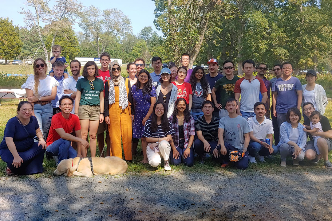 a group picture of GW Economics students and faculty