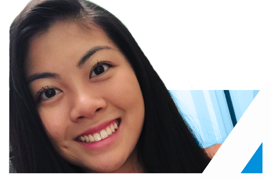 Genna Tatu, Recipient of the John Stuart Whetzel Jr. Endowed Economics Scholarship, smiling in front of a white background