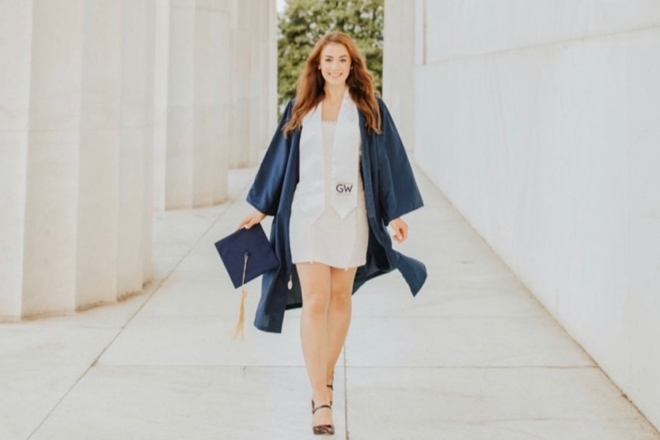 Photo of Leigh Payne in graduation gown