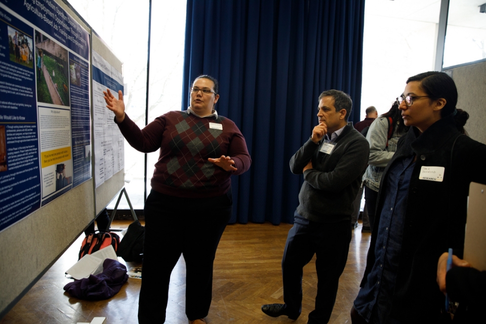 Doctoral candidate Katherine Hurley (left) talks about her GW Research Days poster with Provost Forrest Maltzman 