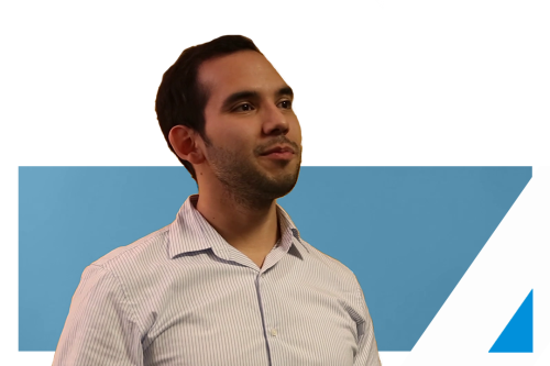 2018 M.A. in Applied Economics Student, Mario Escarcega, in a white shirt